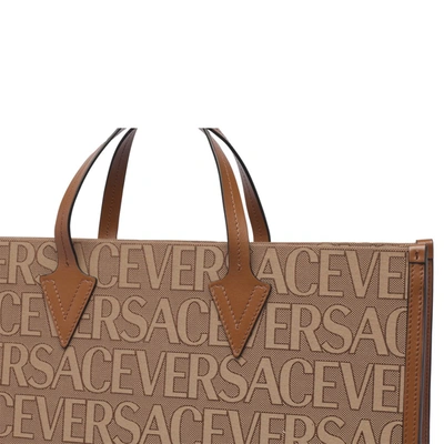 Shop Versace Bags In Brown