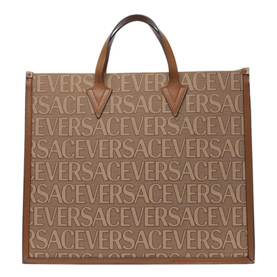 Versace Shopper Bag With Allover Logo In Brown
