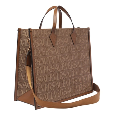 Versace Shopper Bag With Allover Logo In Brown