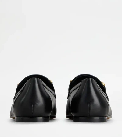 Shop Tod's Flat Shoes In Black