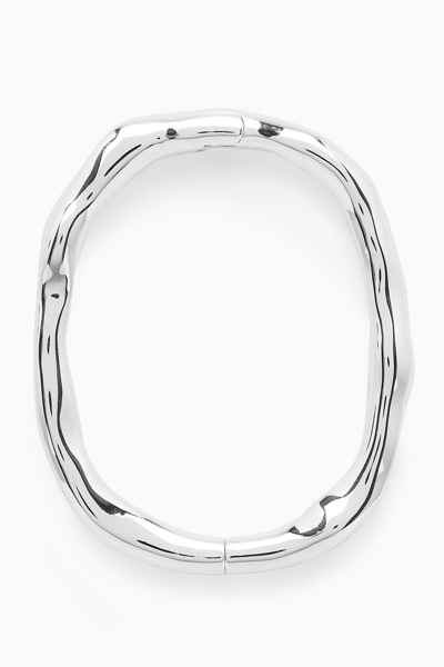 Shop Cos Hammered Bangle In Silver