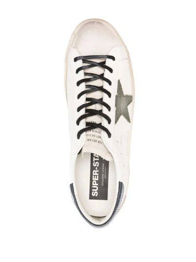 Shop Golden Goose White Super-star Green Star Sneakers