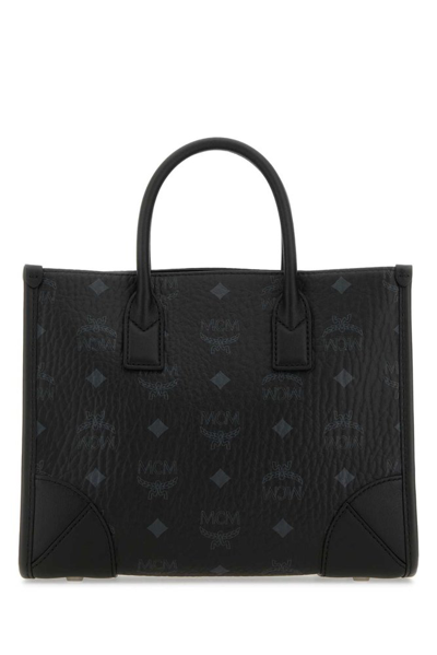 Shop Mcm Munchen Small Top Handle Bag In Black
