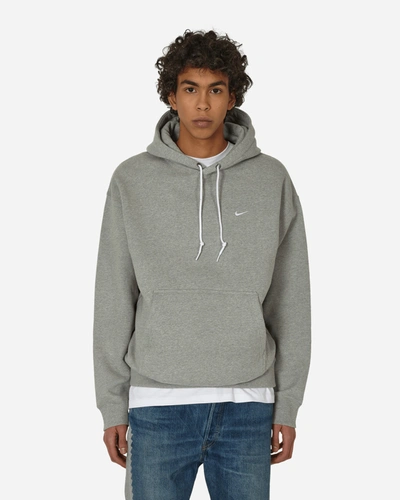 Shop Nike Solo Swoosh Hooded Sweatshirt Dark Grey Heather In Multicolor