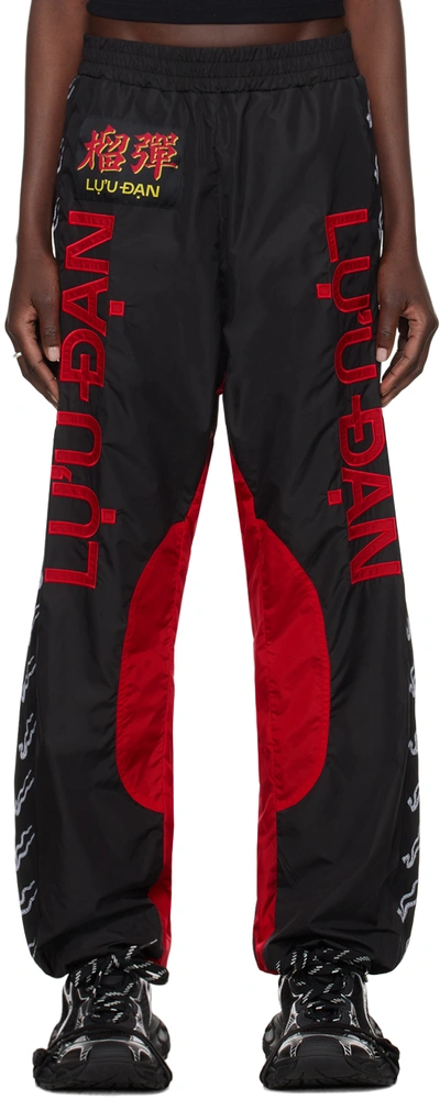 Shop Lu'u Dan Black & Red Shell Track Pants In Mp031w