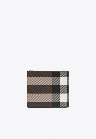 Shop Burberry Bi-fold Checked Leather Wallet In Brown
