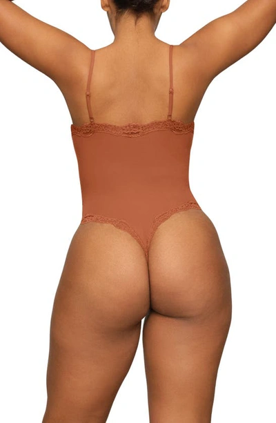 Shop Skims Fits Everybody Lace Camisole Bodysuit In Bronze