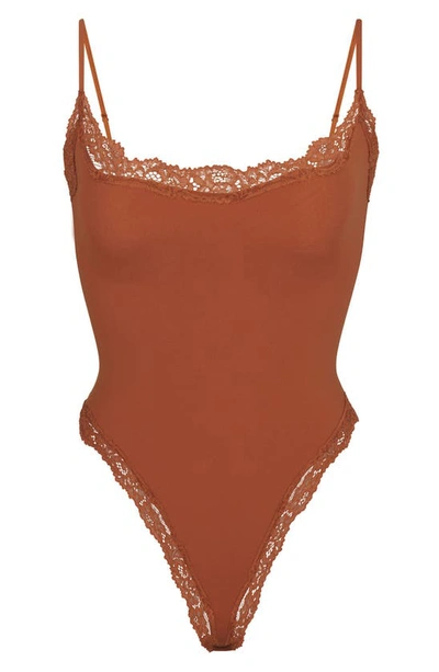 Shop Skims Fits Everybody Lace Camisole Bodysuit In Bronze