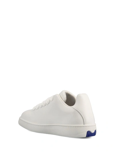 Shop Burberry Sneakers In White