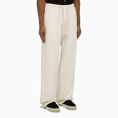 Shop Palm Angels Off-white Jogging Trousers With Monogram