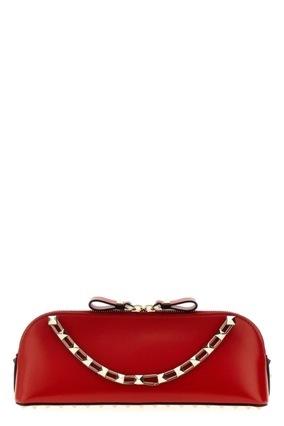 Shop Valentino Garavani Women  Garavani 'rockstud' Clutch Bag In Red