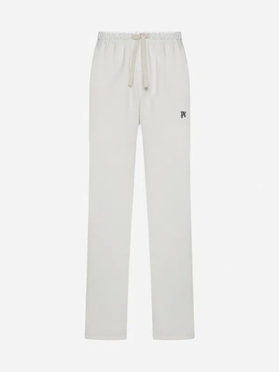 Shop Palm Angels Lyocell And Cotton Trousers In Off White,black