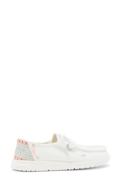 Shop Hey Dude Wendy Slip-on Sneaker In Lily White