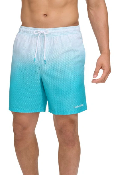 Shop Calvin Klein Volley Core Gradient Dot Swim Trunks In Atlantis