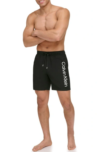 Shop Calvin Klein Core Volley Swim Trunks In Black