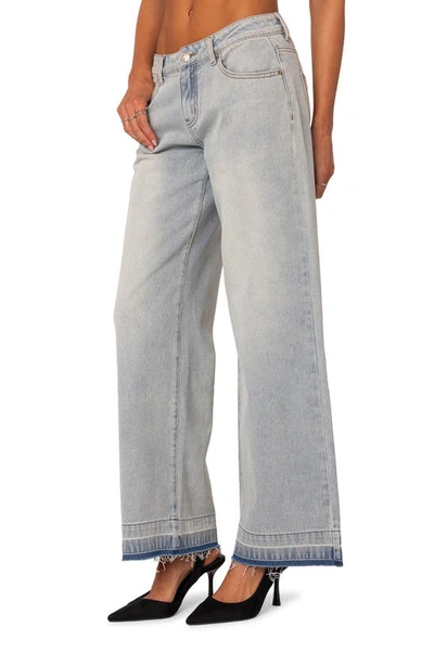 Shop Edikted Release Hem Low Rise Jeans In Light-blue