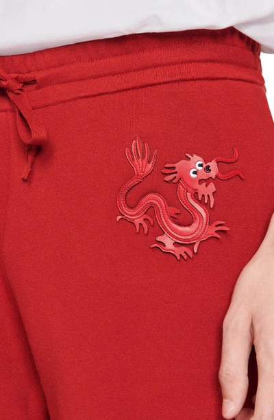 Shop Sandro Dragon Patch Knit Shorts In Red