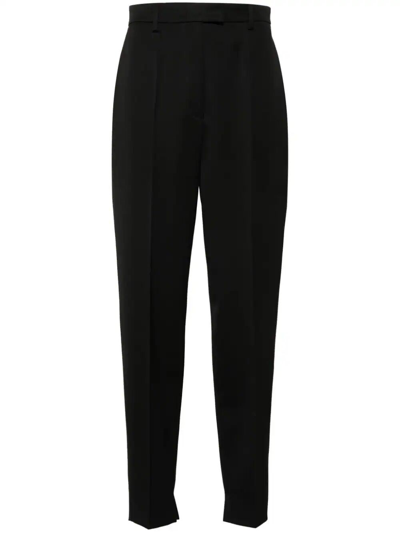 Prada Natte Tapered-leg Mid-rise Stretch-wool Trousers In Black