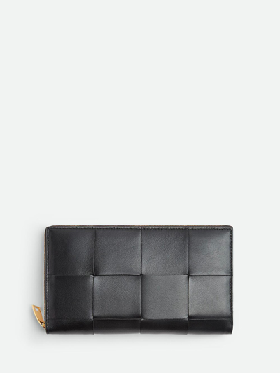 Shop Bottega Veneta Zipped Wallet In Black