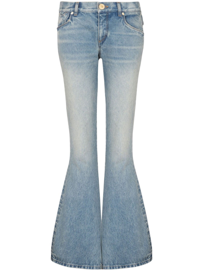 Shop Balmain Western Flared Jeans With Low Waist In Blue