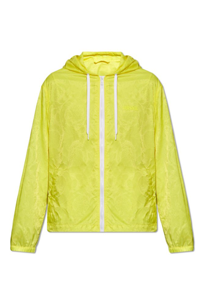 Shop Versace Zipped Drawstring Hooded Jacket In Yellow