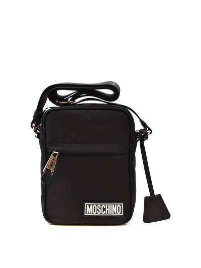 Shop Moschino Cross Body Bag In Black