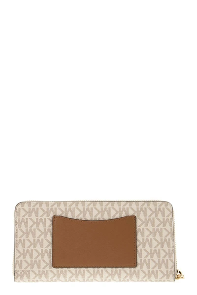 Shop Michael Kors Continental Wallet With Printed Canvas In Vanilla