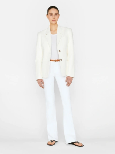 Shop Frame Le High Flare Jeans In White