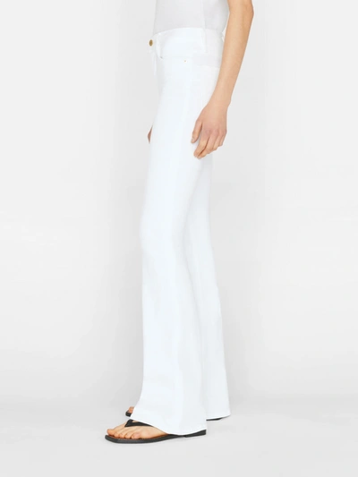 Shop Frame Le High Flare Jeans Blanc Denim In White