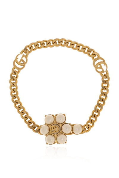 Shop Gucci Logo Plaque Pearl Detailed Bracelet In Gold
