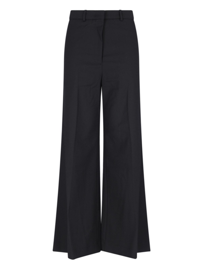 Shop Low Classic Flare Pants In Black  