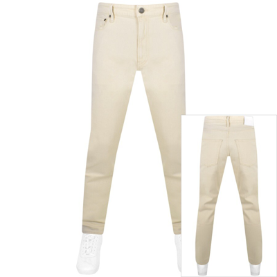 Shop Calvin Klein Tapered Fit Jeans Beige