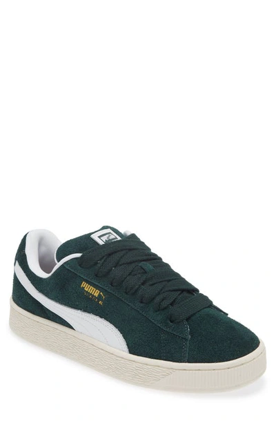 Puma Clyde Low-top Suede Sneakers In Ponderosa Pine-frosted Ivory