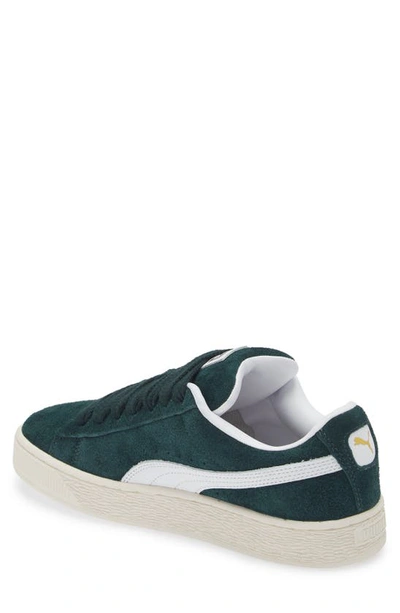 Puma Clyde Low-top Suede Sneakers In Ponderosa Pine-frosted Ivory