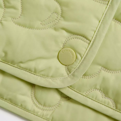 Shop Coach Topia Loop Quilted Heart Mini Skirt In Pale Lime