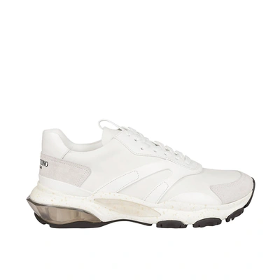 Shop Valentino Bounce Sneakers In White