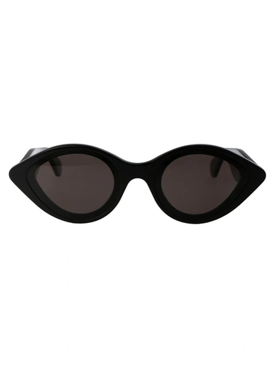 Shop Alaïa Alaia Sunglasses In 001 Black Black Grey