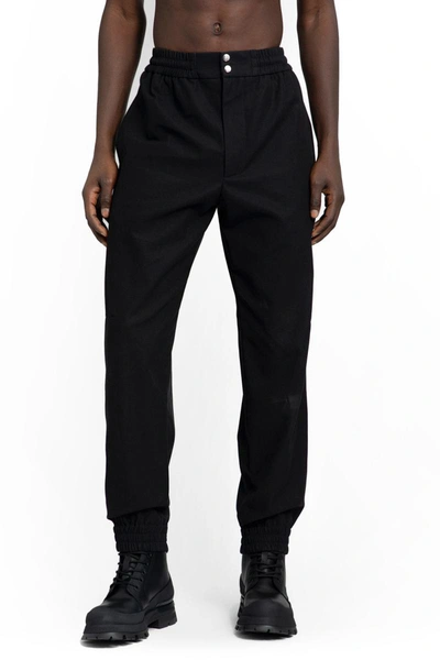Shop Alexander Mcqueen Trousers In Black