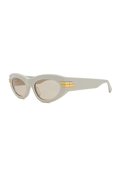 Shop Bottega Veneta Bold Ribbon Cat Eye Sunglasses In White