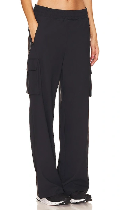 Shop Beyond Yoga City Chic Cargo Pant In Black