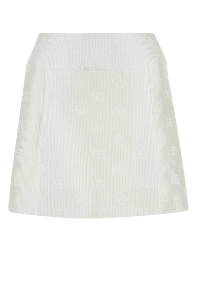 Shop Dolce & Gabbana Dg Logo Quilted Jacquard Mini Skirt In White