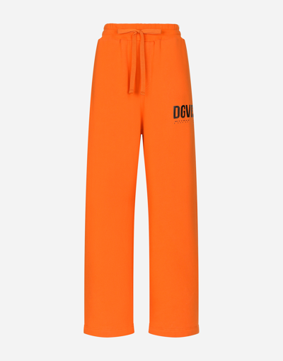 Shop Dolce & Gabbana Jersey Jogging Pants With Dgvib3 Print In Orange