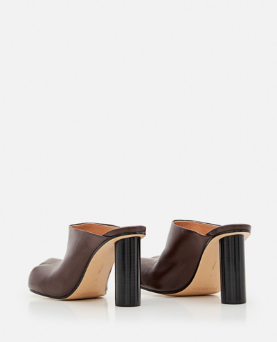 Shop Jw Anderson Leather Mules With Heel In White