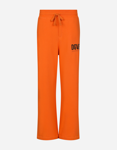 Shop Dolce & Gabbana Jersey Jogging Pants With Dgvib3 Print And Logo In Orange