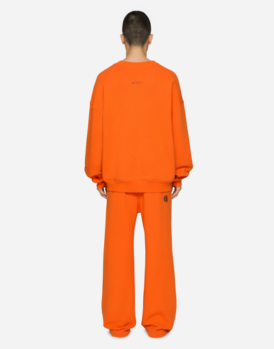 Shop Dolce & Gabbana Jersey Jogging Pants With Dgvib3 Print And Logo In Orange