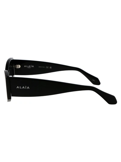 Shop Alaïa Alaia Sunglasses In 001 Black Black Grey