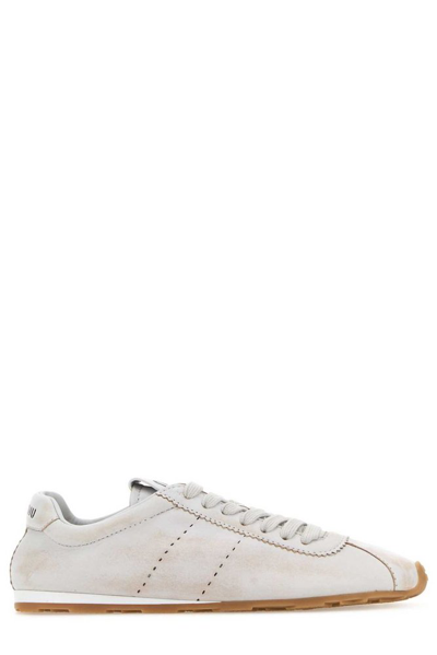 Shop Miu Miu Bleached Sneakers In White