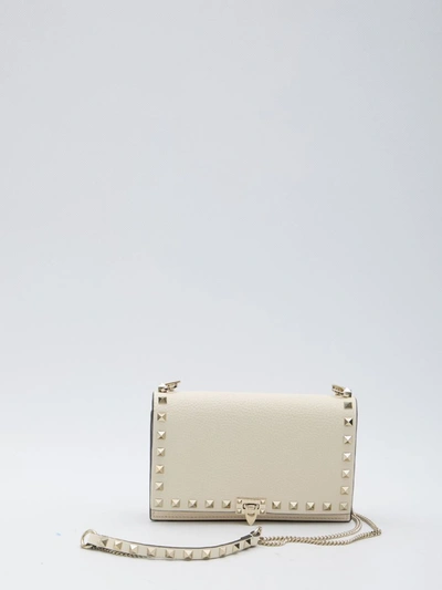 Shop Valentino Rockstud Small Bag In Cream