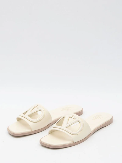 Shop Valentino Vlogo Slide Sandals In Cream