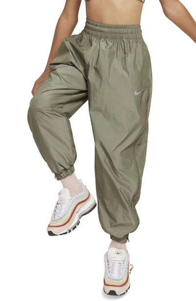 Shop Nike Kids' Sportswear Woven Pants In Medium Olive/ Light Bone